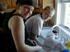 Katy and Megan prepare the turkey