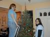 Monica, Megan, and Diana decorating the tree